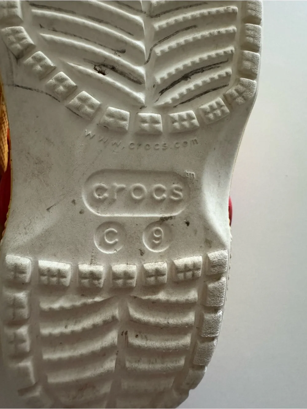 CROCS Kids Yellow Clogs with Red Heel Straps - Winnie the Pooh Theme